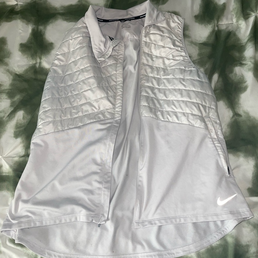 Nike very light gray not white vest.